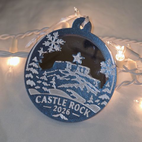The same ornament in Sparkle, a blue with glitter in it.